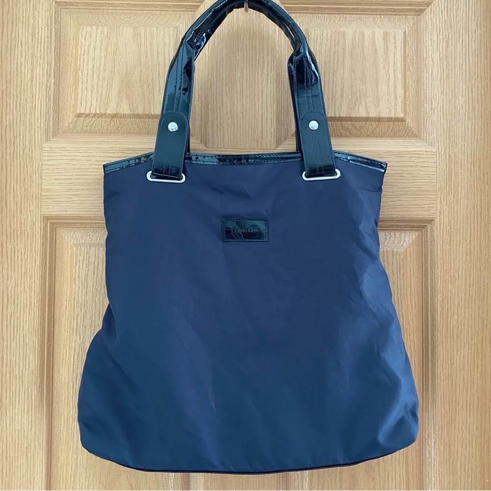 Like new Calvin Klein Navy Blue Nylon Leather Tote